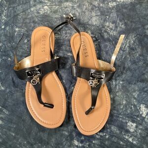 Guess black sandals.